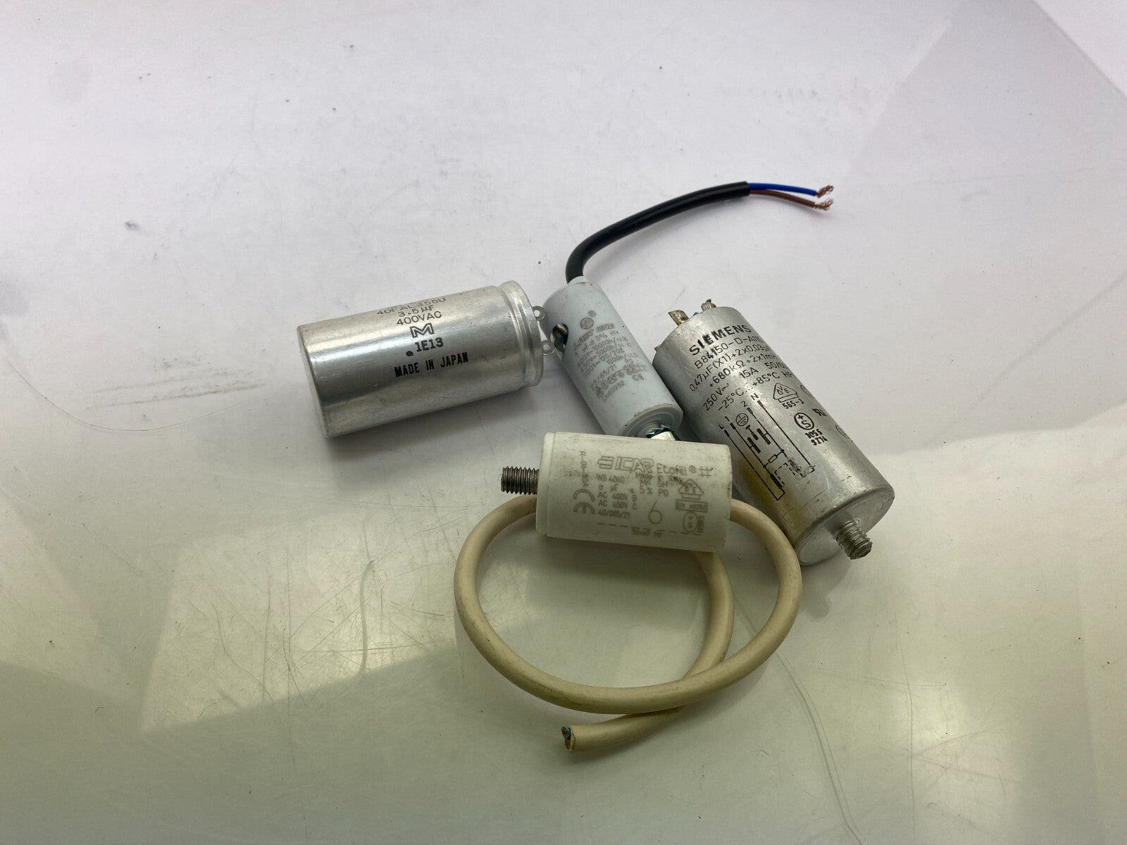 POSTEN..SIEMENS B84150-D-A 115 0,47uF(X1)+2 x 0,03 uF+Marcon 40FAL355U 3.5uF 4..