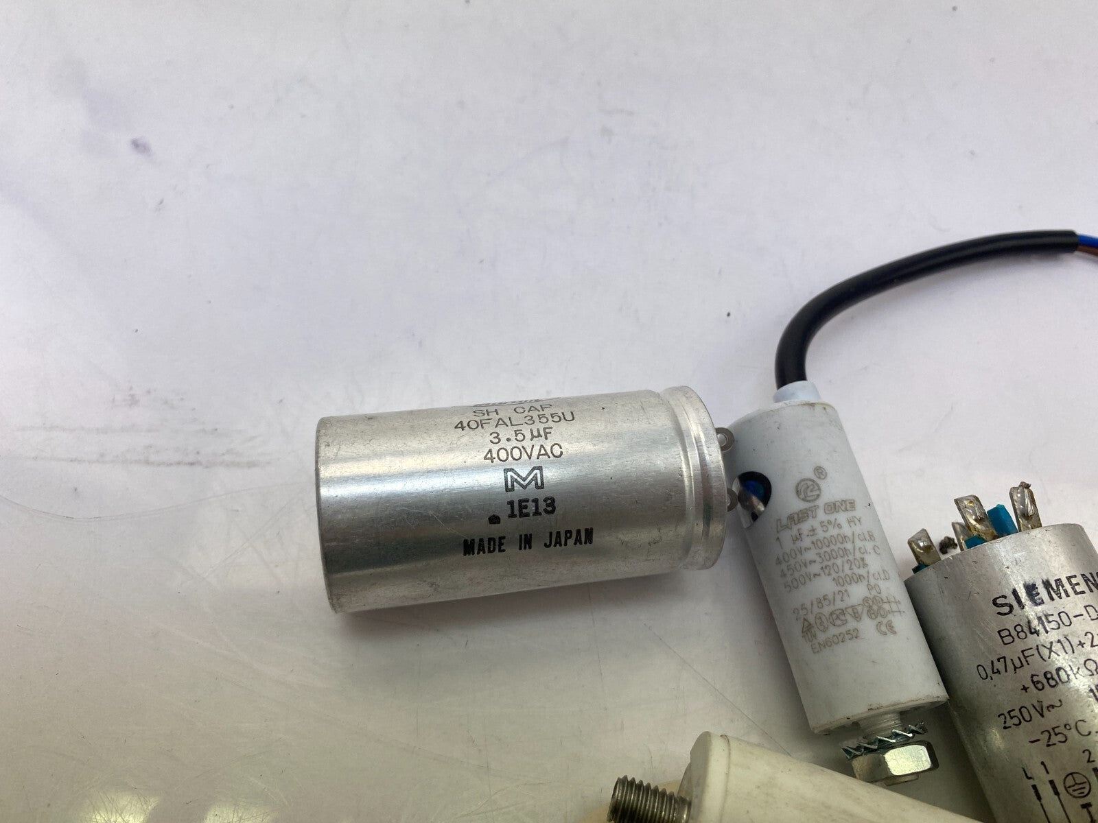POSTEN..SIEMENS B84150-D-A 115 0,47uF(X1)+2 x 0,03 uF+Marcon 40FAL355U 3.5uF 4..